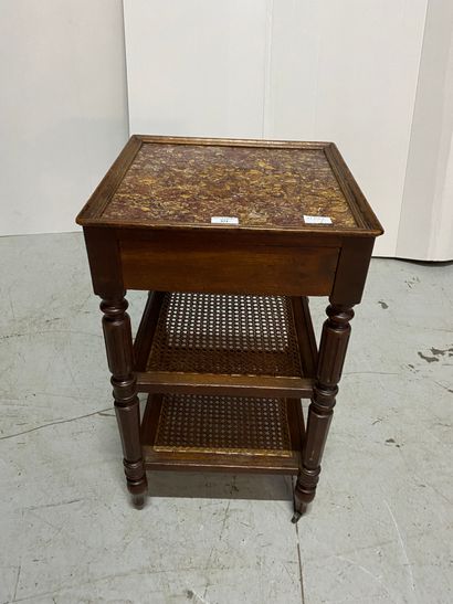 Square marble-topped bedside table with four...