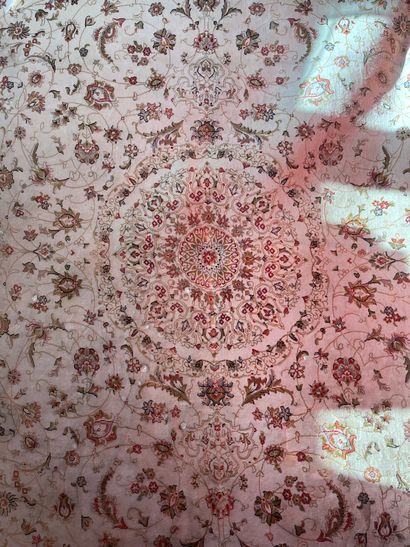 Wool and silk carpet, beige background with...