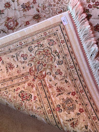 Wool and silk carpet, beige background with...
