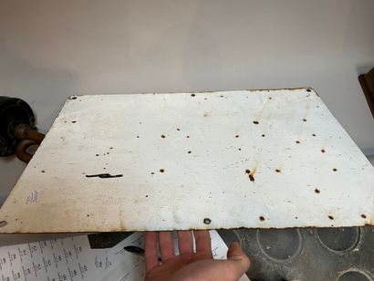 An enameled Castrol oil advertising plate...