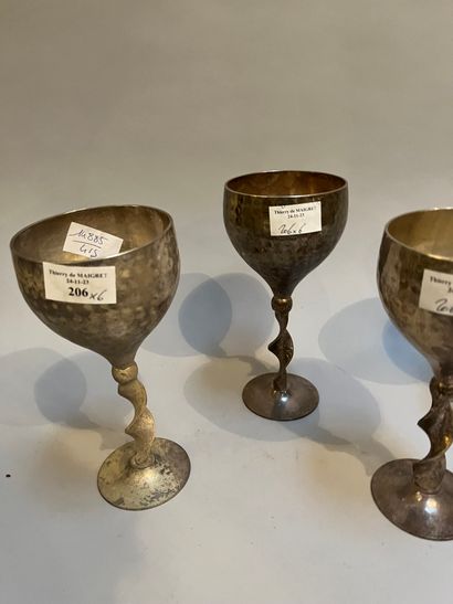 Six silver-plated stemmed glasses with hammered...