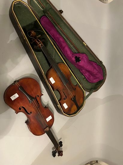 2 violins, one in its case with archer, 1...