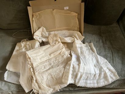 Set with little dresses including a christening...