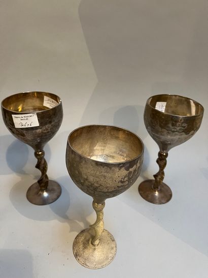 Six silver-plated stemmed glasses with hammered...