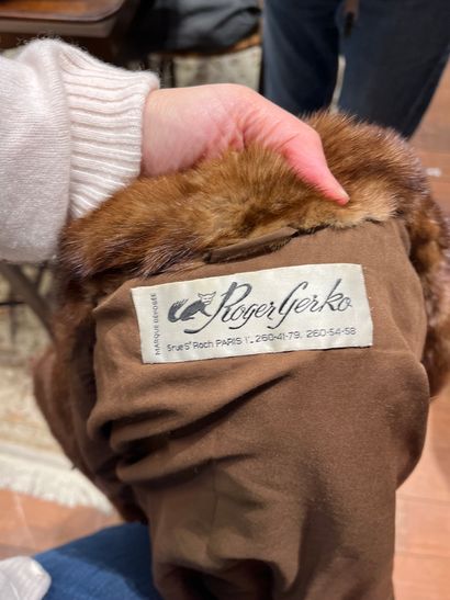 A coat (worn) Roger Gerko
