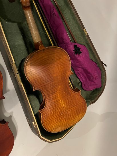 2 violins, one in its case with archer, 1...