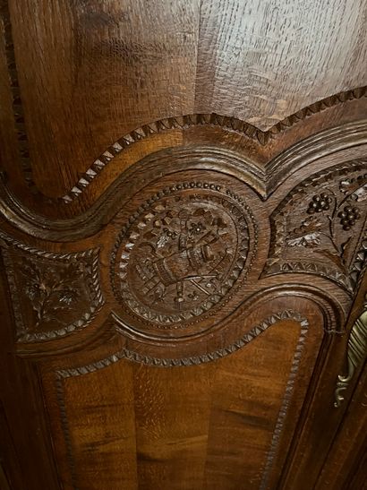 Norman cabinet with carved decoration of...