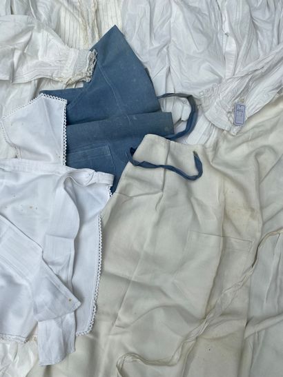 Large lot of white or blue aprons, blouses...