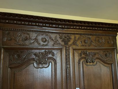 Norman cabinet with carved decoration of...