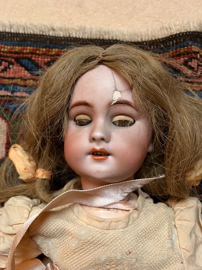 Doll
Bisque head, open mouth, movable eyes,...