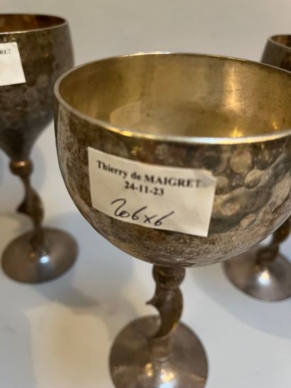 Six silver-plated stemmed glasses with hammered...