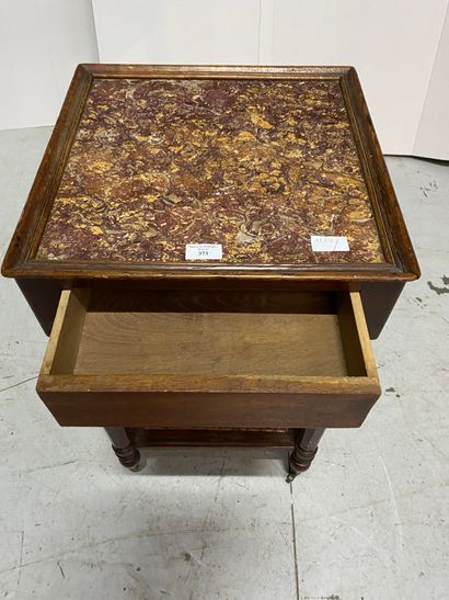 Square marble-topped bedside table with four...