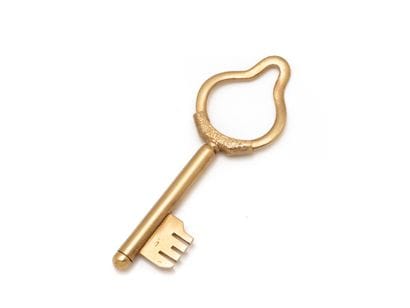 Porte-clé en or 750 stylisant une clef. Travail...