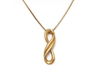 VCA. Pendant brooch stylizing a knot in 750...
