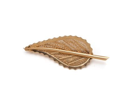 Broche en or 750 millièmes stylisant une...