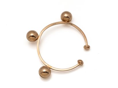 Bracelet jonc rigide ouvert en or 750 millièmes,...