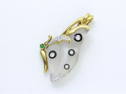 Broche pendentif deux ors 750 millièmes stylisant...