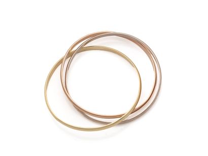 CARTIER ‘’TRINITY’’. Bracelet trois tons...
