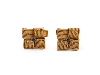 Pair of 750 thousandths gold cufflinks, composed...