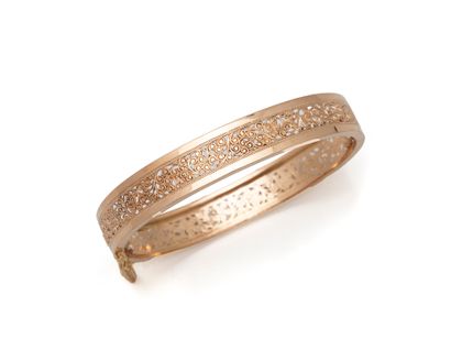Bracelet jonc rigide ajouré en or 750 millièmes,...
