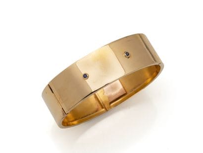 Bracelet jonc rigide articulé en or 750 millièmes...