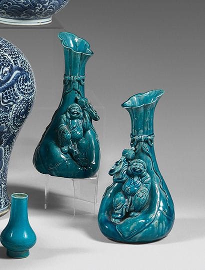 CHINA
Pair of turquoise enameled cookie vases...