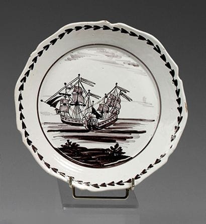 NEVERS
Earthenware plate with contoured rim...