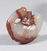 CHINA - 19th century
Red and white carved...