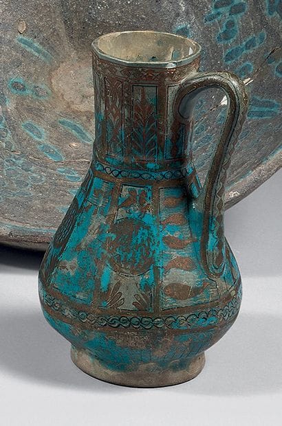 Jug with faceted body and high neck, fitted...