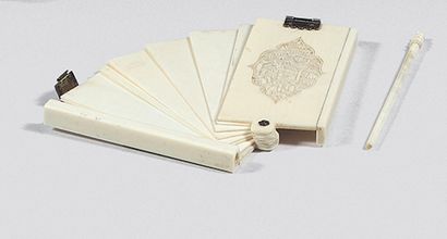 CHINA
Carved ivory ball book of rectangular...