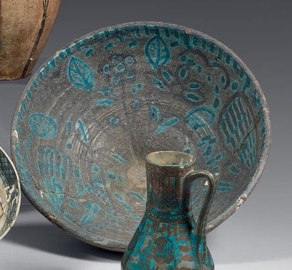 Large thick ceramic bowl with traces of throwing,...