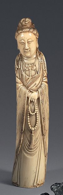 CHINA
Carved ivory figurine representing...