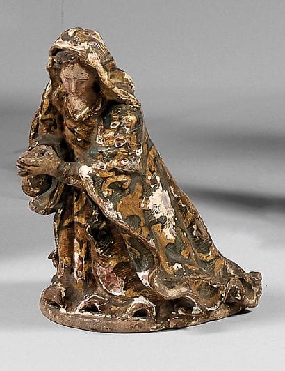 Kneeling young woman in prayer, in polychrome...
