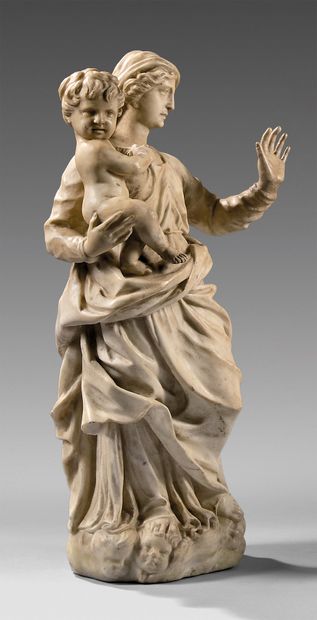 Virgin and Child in carved white marble....