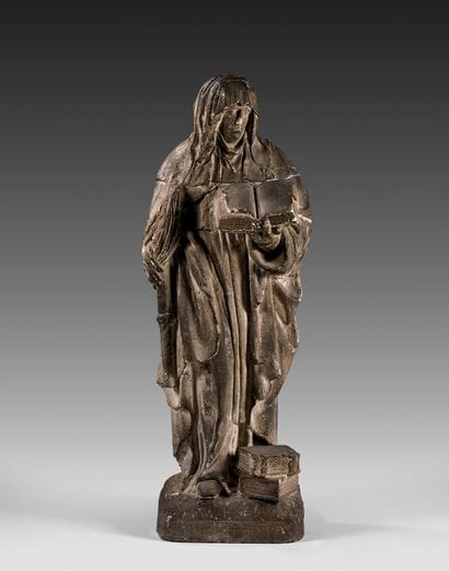Beautiful and rare statue of a woman reading...