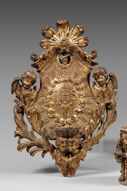 Carved and gilded limewood wall stoup with...