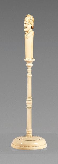 Carved ivory bust representing a grotesque...