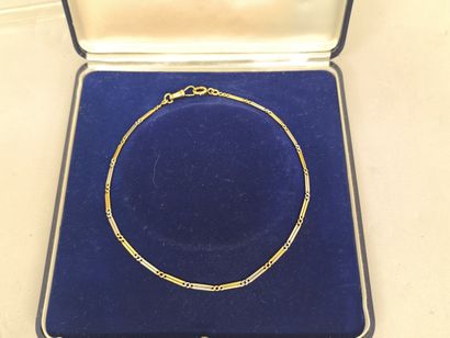 Two gold 750°/°° watch chain, flat openwork...