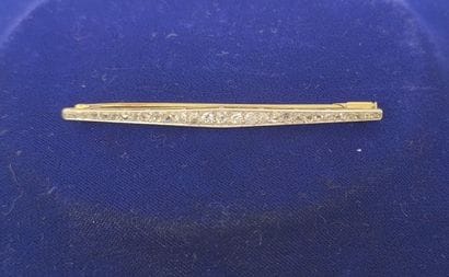 Barrette brooch in 750°/°° gold with a line...
