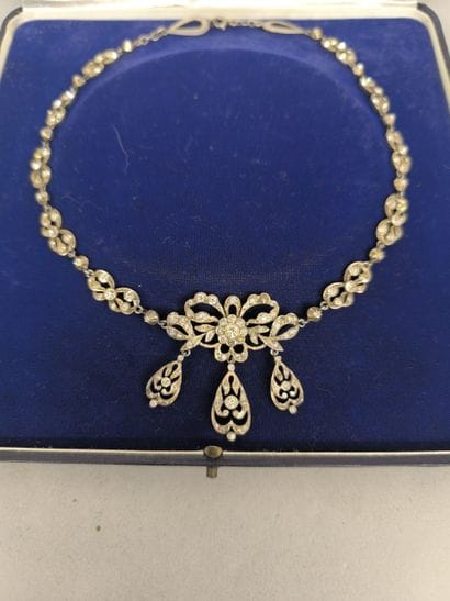 Fancy drapery necklace decorated with bows,...