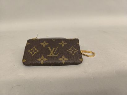 LOUIS VUITTON
Double coin purse in monogrammed...