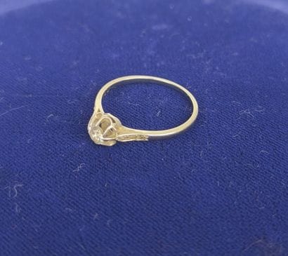 Solitaire ring in platinum centered with...