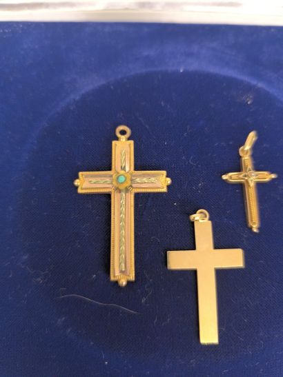 Two crosses in 750°/°° gold mounted as pendants....
