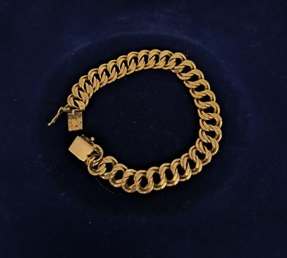 Gourmette bracelet in 750°/°° gold, openwork...