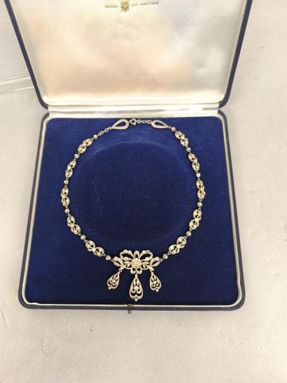 Fancy drapery necklace decorated with bows,...