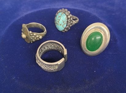 Set of 4 ethnic style rings including : 
-Ring...