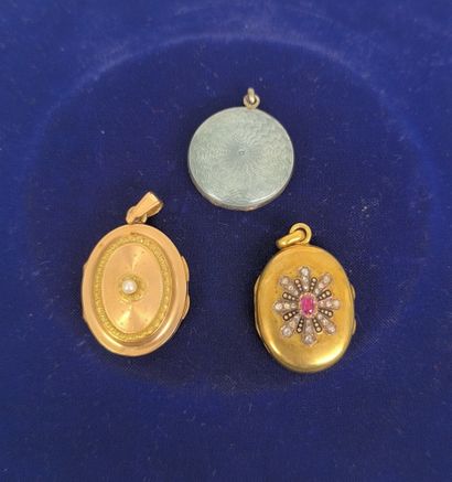 Two 750°/°° gold photo pendants, one with...