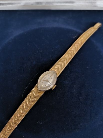 UTI. Ladies' wristwatch in 750°/°° gold,...