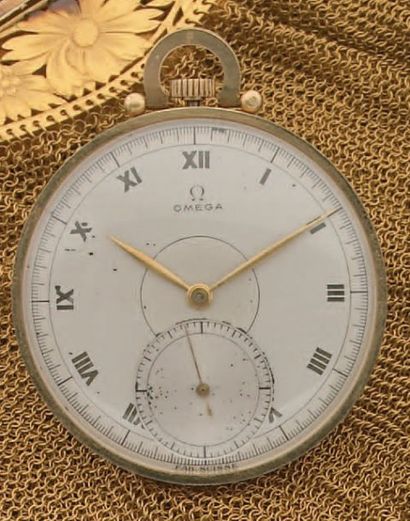 OMEGA
Montre de poche en or, cadran argenté...