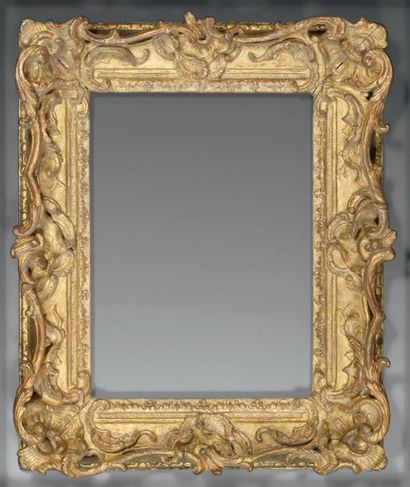 Cadre à profil inversé en bois sculpté et...